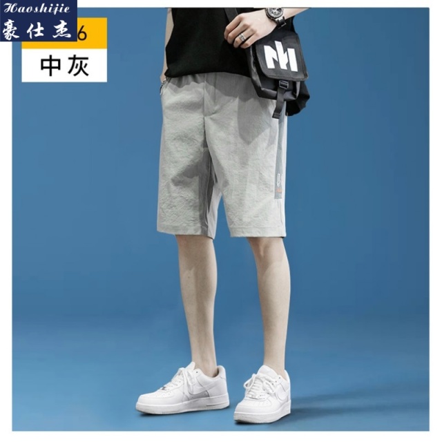 13685693.《休闲百搭》夏季爆款时尚小刺绣宽松简约男款户外运动短裤