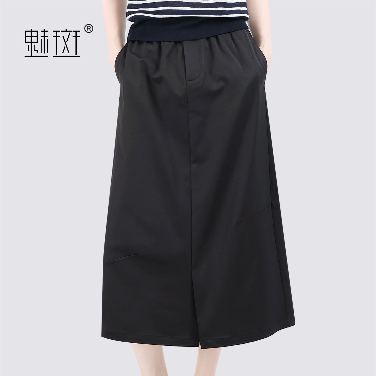 13697190.魅斑黑色半身裙高腰A字裙