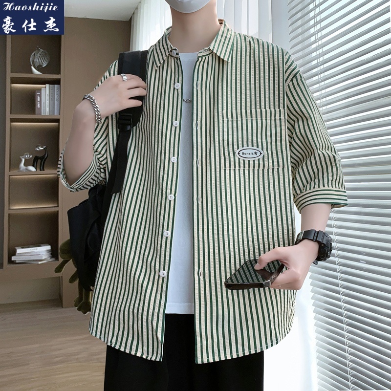 13747054.《简约时尚》夏季新款休闲港风棉质条纹男士七分中袖衬衫