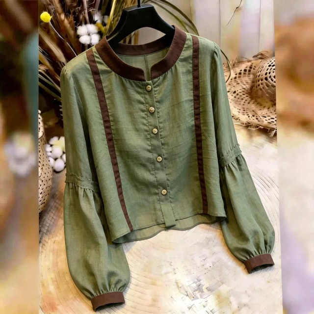 13808316.丹芙娅通勤风绿色灯笼袖衬衫女撞色拼接气质百搭上衣超好看时尚2026秋季