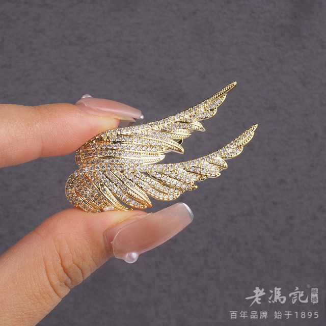 8619341.(店长推荐)天使的翅膀闪钻精致双羽毛胸针金色